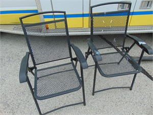 Two Black Folding Chairs