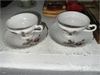 2-TEA CUPS AND SAUCERS