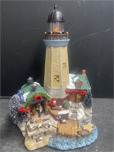 Illuminated lighthouse Christmas decoration.