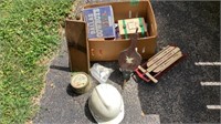 Hard hat, tin full of buttons, wood slicer,