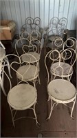 10 chairs with designs on back