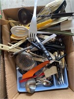 two boxes of kitchen items, including flatware