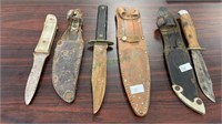 3 hunting knives, with leather sheaths, all three