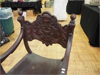 Vintage Savonarola armchair with carving