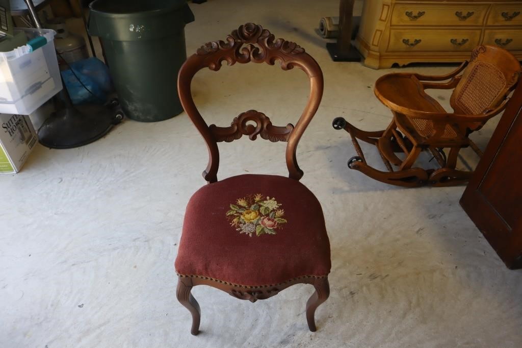 Mahogany carved chair with needle point seat