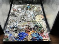 LARGE ASSORTMENT OF SILVER TONE COSTUME JEWELRY