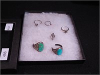 Group of sterling jewelry: three rings, one small