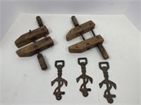 Primitive wooden clamps. and cast bottle openers