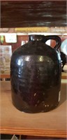 Old crock quart whiskey jug