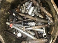 Pail of assorted lag screws and similar pieces.