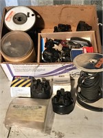 Assorted vehicle parts. Includes thermostats,