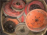 Large assortment of pulleys in a box.
