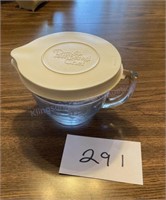 Pampered chef measuring cup with lid