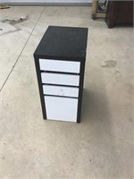 Unliquidated modern 4 drawer cabinet. 14 x 20 x