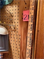 Local ad Yardsticks, wooden paddle