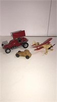 Old toys, 2 cars and an airplane