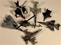 Various Tiny Airplane Models Including Helicopter