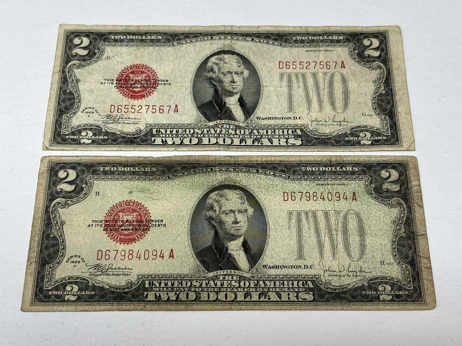 Two 1928-F $2 US Red Seals