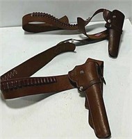 2 leather holsters and belts