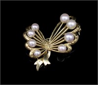 Mikimoto pearl and 14ct yellow gold bow brooch