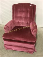 Pink swivel rocking chair