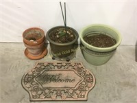 Varies flower pots @ welcome mat