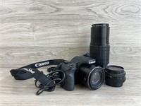 Canon Camera w/ 58 mm Skylight Lens