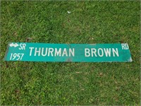 Thurman brown Street sign