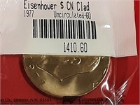 EISENHOWER DOLLAR SEALED FROM THE MINT GRADED-60