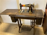 Singer Sewing machine. Works. Tin stand