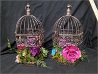 Two cute decorative birdhouse with fake flowers