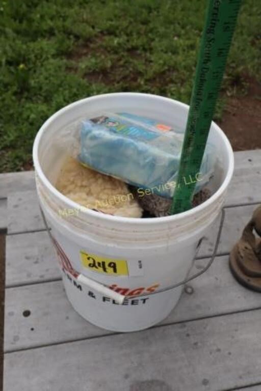 bucket of car wash supplies