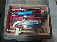 assortment of pullers and tools