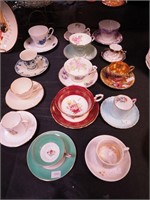 16 vintage decorated cups and saucers, some