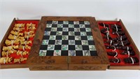 Asian style carved wood chess
 set