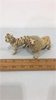 Pair of Paper mache lion and tiger figurines,