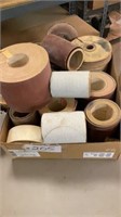 Box of rolls of sanding paper