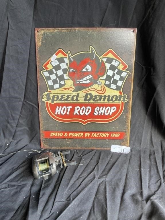 Tin Hoot Rod sign and old fishing reel