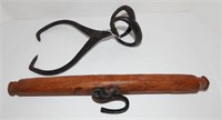 Pair of vintage cast iron ice tongs and single