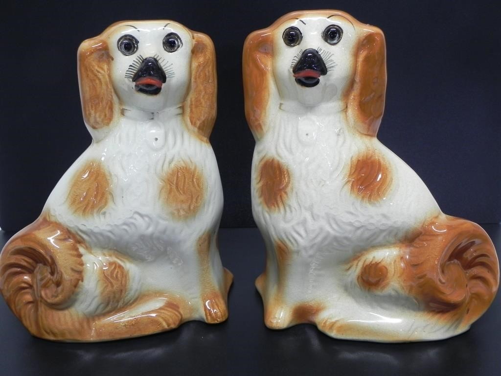 PAIR OF STAFFORDSHIRE WHITE & ORANGE SPANIELS