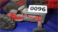 3- Tootsie toy tractors and 1 other