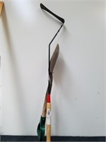 Small shovel with grass whip cutter
