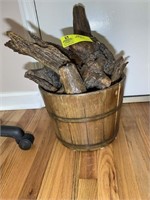 wooden barrel with drift wood pieces