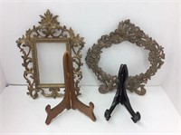 two metal desk top frames with mismatched stands