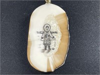 Fossilized ivory cross piece pendant with Alaskan