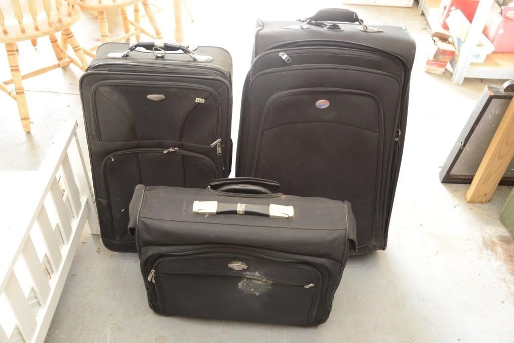 AMERICAN TOURISTER SUITCASES