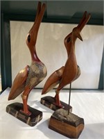 Wooden birds statues