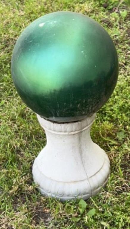 Glass ball on a 11” cast iron stand