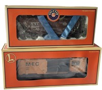 TWO LIONEL TRAIN CARS NEW IN BOX, NYC AND MEC