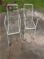 2 White metal chairs- has some rust on leg